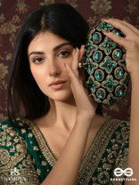 NEELZARA – OVAL DARK GREEN VELVET CLUTCH WITH INTRICATE STONE AND ZARDOZI WORK AND GOLDEN METAL FRAME