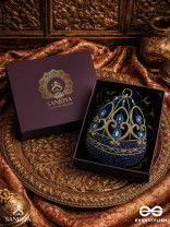 SITARAA – POLISHED OVAL ROYAL BLUE VELVET CLUTCH WITH STONE-ACCENTED HANDWORK AND GOLDEN METAL FRAME