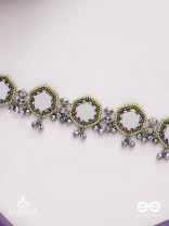 Chāyāmālā-Reflective choker- oxidized choker featuring intricate beadwork, mirrors, ghungroo (small bells), and thread details