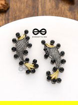 The Dual-Tone Embellished Fish Studs (Onyx Black)