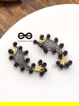 The Dual-Tone Embellished Fish Studs (Onyx Black)