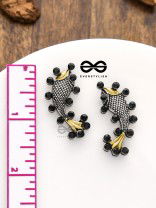 The Dual-Tone Embellished Fish Studs (Onyx Black)
