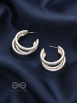 THE ELEGANT TURNS - MATTE FINISHED SILVER HOOPS