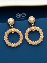 The Pearl Paradox - Statement Golden Earrings