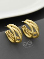 The Elegant Turns - Matte Finished Golden Hoops