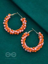 The Beaded Twists - Statement Hoops (Orange-Pink)