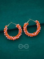 The Beaded Twists - Statement Hoops (Orange-Pink)