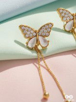 Buzzerflies- Gemstone and Rhinestones Studded Golden Earrings