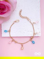 The Shimmering Sleet- Pearl and Crystals Studded Golden Bracelet