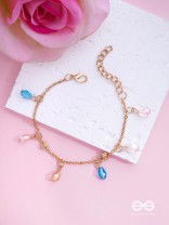 The Shimmering Sleet- Pearl and Crystals Studded Golden Bracelet