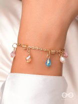The Shimmering Sleet- Pearl and Crystals Studded Golden Bracelet