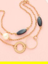 Day 'n' Nite- Pearl and Stones Studded Golden Bracelet