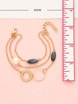 Day 'n' Nite- Pearl and Stones Studded Golden Bracelet