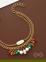 The Divine Galaxy- Pearls and Beads Studded Golden Bracelet