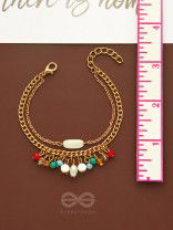 The Divine Galaxy- Pearls and Beads Studded Golden Bracelet