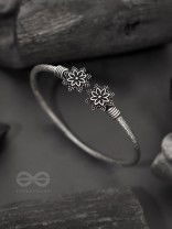 Ups-a-Daisy- Oxidised Bangle Bracelet