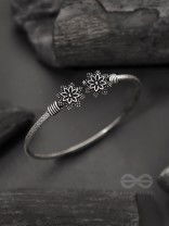 Ups-a-Daisy- Oxidised Bangle Bracelet