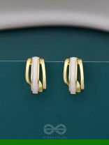 A CLASSY DAME - WHITE ENAMELLED GOLDEN STUDS