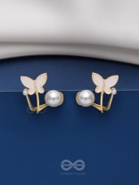 A WINGED WONDER - GOLDEN AND WHITE EAR JACKETS