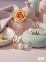 A WINGED WONDER - GOLDEN AND WHITE EAR JACKETS