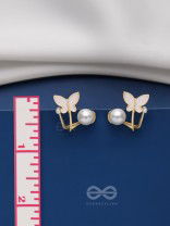A WINGED WONDER - GOLDEN AND WHITE EAR JACKETS
