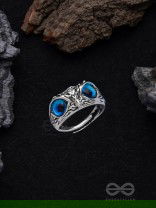 A KNOW-IT-OWL - BLUE EYED SILVER RING