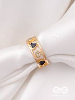 ENVELOPED IN HEARTS - GOLDEN STATEMENT RING (BLACK)