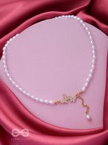 TWO TINY AVIATORS - GOLDEN PEARL NECKPIECE