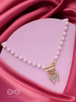 A FLYING MIRACLE - GOLDEN PEARL NECKPIECE