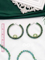 THE ENCHANTED CIRCLETS - STATEMENT HOOP EARRINGS