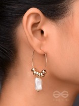 BEADED SUNBURST - GOLDEN HOOP EARRINGS