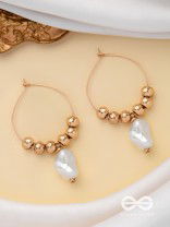 BEADED SUNBURST - GOLDEN HOOP EARRINGS