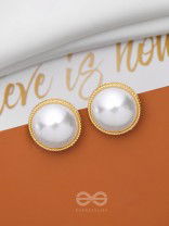 THE IVORY ILLUSION - GOLDEN PEARL STUD EARRINGS