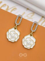 THE MIDNIGHT ROSE - GOLDEN AND WHITE EMBELLISHED EARRINGS