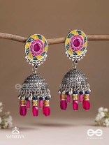 Suryaruchi-Sun's Radiance-Lavish pink earrings enamelled with a sun motif and oxidized jhumka adorned with beads and ghunghroos