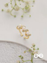 The Twisted Elegance - Cubic Zirconia Golden Ring (Adjustable)