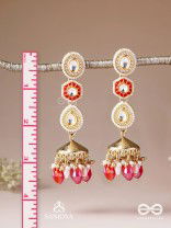 Suvarnmani - The Golden Gem –Golden enamel earrings adorned with gemstones and dangling beads