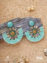 Vibhusitpuspa - the adorned flower - embroidered flower earrings with turquoise tassles