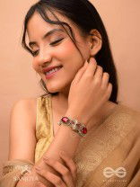 Sundarasūra- Beautiful Wine- Bracelet with rich hue of the red stones and twisted thread work.