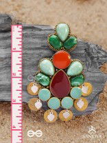 Vikṛtiśīla- Elegant Form-Chunky blue, green, and rust-colored stones with a distinctive golden-silver leaflet design