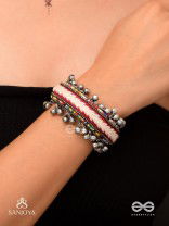 SHAKHAABANDHA- BRANCH BIND- OXIDIZED HAND EMBROIDERED BRACELET, THREAD WORK ACCENTED WITH GHUNGROO AND BEADS