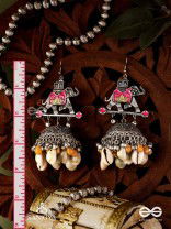 GAJASANKHA KARṆIKA- ELEPHANT-SHELL EARRINGS- OXIDIZED EARRINGS FEATURING AN ELEGANT MOTIF, DELICATE GHUNGHROO'S, AND COWRIE SHELLS
