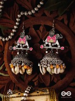 GAJASANKHA KARṆIKA- ELEPHANT-SHELL EARRINGS- OXIDIZED EARRINGS FEATURING AN ELEGANT MOTIF, DELICATE GHUNGHROO'S, AND COWRIE SHELLS