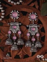 VIJAYAMUKTA-VICTORY PEARLS- REGAL OXIDIZED EARRINGS WITH A CENTRAL PURPLE STONE AND LAYERED JHUMKAS