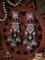 VIJAYAMUKTA-VICTORY PEARLS- REGAL OXIDIZED EARRINGS WITH A CENTRAL PURPLE STONE AND LAYERED JHUMKAS