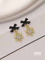 Nocturnal snowcharms- Dangling earrings with black velvety bows and golden stars 