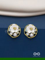 Divine temptation- white floral studs encircled with golden mesh 