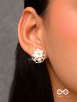 Divine temptation- white floral studs encircled with golden mesh 
