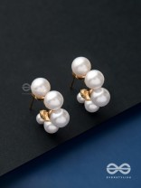 Plush desires- Golden circular earrings with studded pearls 