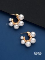 Plush desires- Golden circular earrings with studded pearls 